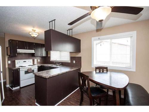 7901 Poplar Drive, Grande Prairie, AB - Indoor Photo Showing Kitchen With Double Sink
