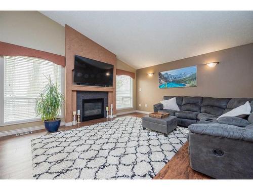 9886 67 Avenue, Grande Prairie, AB - Indoor Photo Showing Living Room With Fireplace