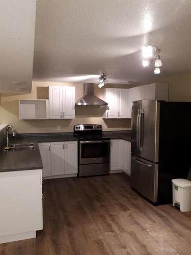 11320 97 Street, Grande Prairie, AB - Indoor Photo Showing Kitchen With Stainless Steel Kitchen