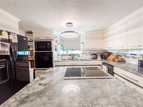 4626 50 Street, Rycroft, AB - Indoor Photo Showing Kitchen With Double Sink