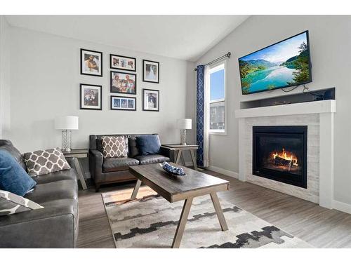 7114 86 Street, Grande Prairie, AB - Indoor Photo Showing Living Room With Fireplace