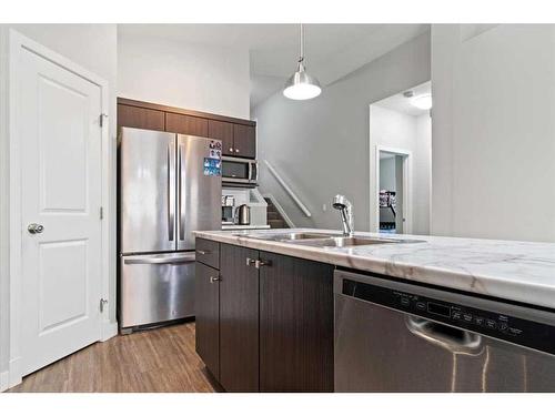 7114 86 Street, Grande Prairie, AB - Indoor Photo Showing Kitchen With Double Sink