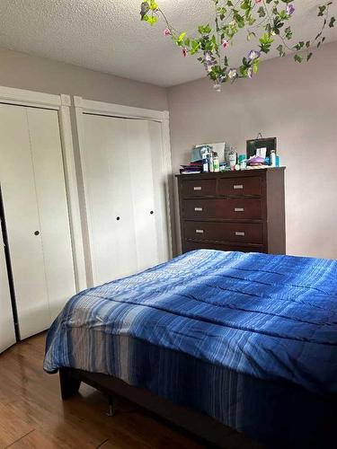 9907 69 Avenue, Grande Prairie, AB - Indoor Photo Showing Bedroom