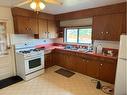 11242 91 Street, Peace River, AB  - Indoor Photo Showing Kitchen With Double Sink 