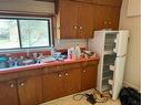 11242 91 Street, Peace River, AB  - Indoor Photo Showing Kitchen With Double Sink 