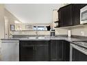 12922 105 Street, Grande Prairie, AB  - Indoor Photo Showing Kitchen With Double Sink 