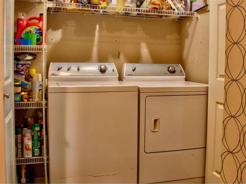 10118 98A Street, Sexsmith, AB - Indoor Photo Showing Laundry Room