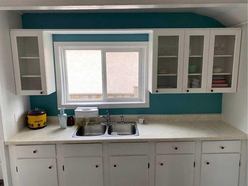 5031 45 Avenue, Spirit River, AB - Indoor Photo Showing Kitchen With Double Sink