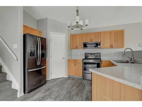 9005 64 Avenue, Grande Prairie, AB - Indoor Photo Showing Kitchen With Double Sink