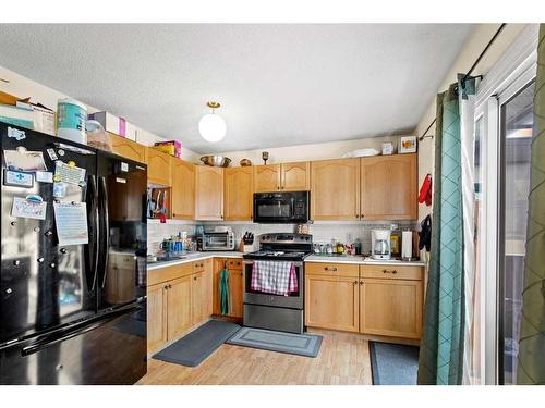 7306 99 Street, Grande Prairie, AB - Indoor Photo Showing Kitchen