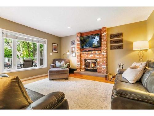 9518 62 Avenue, Grande Prairie, AB - Indoor Photo Showing Living Room With Fireplace