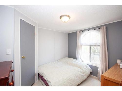 733041 Rge Rd 31, Bezanson, AB - Indoor Photo Showing Bedroom