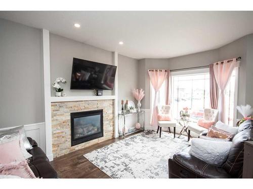 10546 113A Street, Grande Prairie, AB - Indoor Photo Showing Living Room With Fireplace