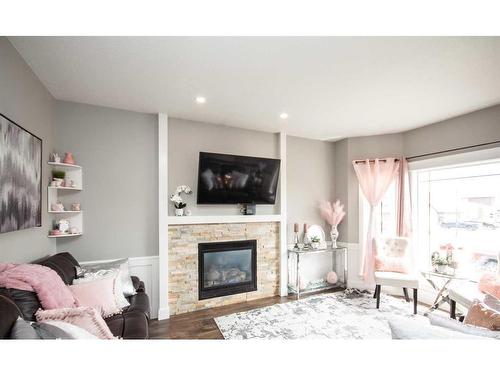 10546 113A Street, Grande Prairie, AB - Indoor Photo Showing Living Room With Fireplace