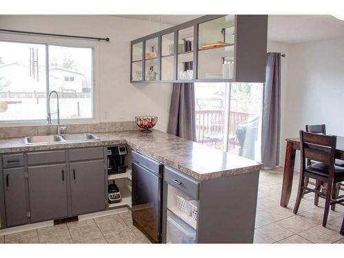 9529 77 Avenue, Grande Prairie, AB - Indoor Photo Showing Kitchen With Double Sink