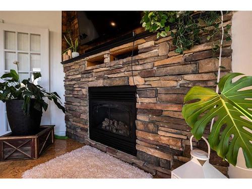 33008 742 Township, Rural Grande Prairie No. 1, County Of, AB - Indoor Photo Showing Living Room With Fireplace