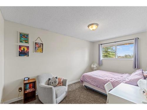 9810 105 Avenue, Grande Prairie, AB - Indoor Photo Showing Bedroom