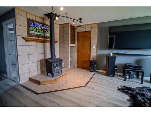 9910 110 Street, Grande Cache, AB - Indoor With Fireplace