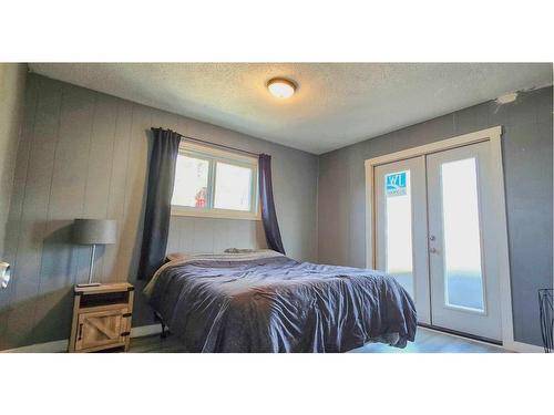 9910 110 Street, Grande Cache, AB - Indoor Photo Showing Bedroom