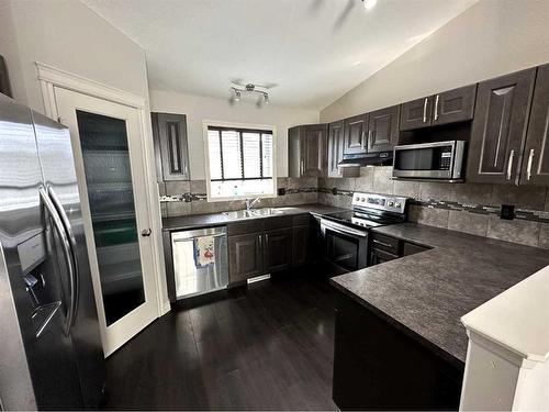 12721 105 Street, Grande Prairie, AB - Indoor Photo Showing Kitchen With Double Sink
