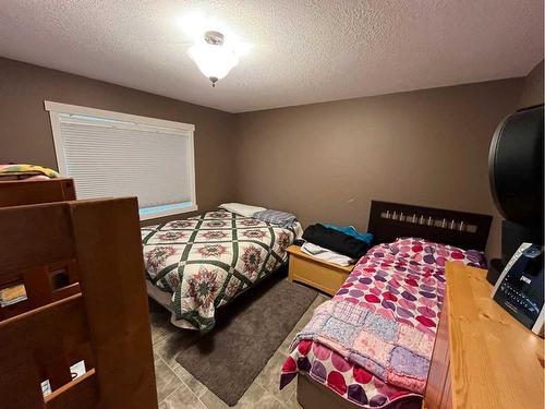 151 Peace Avenue, Joussard, AB - Indoor Photo Showing Bedroom