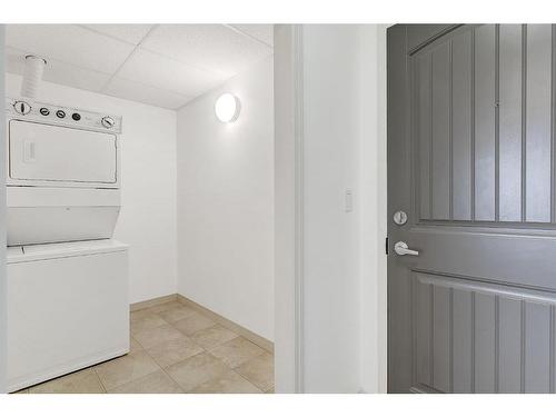 318-9124 96 Avenue, Grande Prairie, AB - Indoor Photo Showing Laundry Room