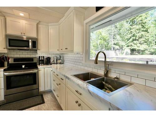 11513 103 Street, Peace River, AB - Indoor Photo Showing Kitchen With Double Sink