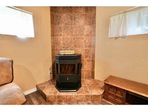 9117 134 Avenue, Peace River, AB - Indoor Photo Showing Other Room With Fireplace