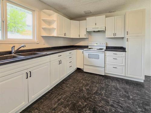 10538 97Th Avenue, Grande Cache, AB - Indoor Photo Showing Kitchen With Double Sink