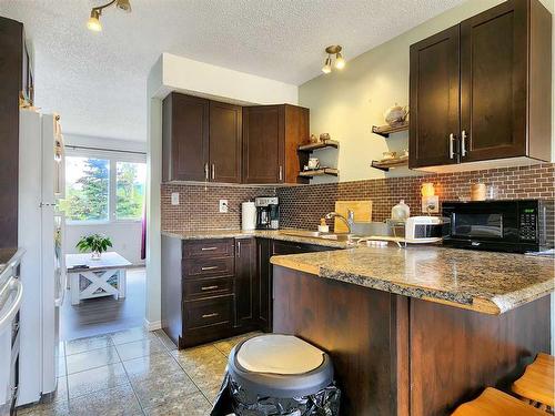 30 97Ave, Grande Cache, AB - Indoor Photo Showing Kitchen