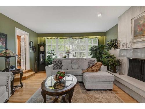 9906 105 Avenue, Grande Prairie, AB - Indoor Photo Showing Living Room With Fireplace