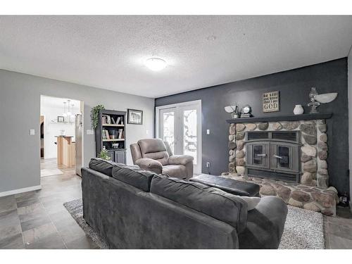 850037 Highway 743, Rural Northern Lights, County Of, AB - Indoor Photo Showing Living Room With Fireplace