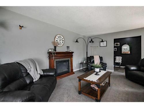 850037 Highway 743, Rural Northern Lights, County Of, AB - Indoor Photo Showing Living Room With Fireplace