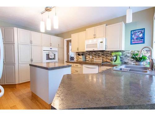 6121 96 Street, Grande Prairie, AB - Indoor Photo Showing Kitchen With Double Sink
