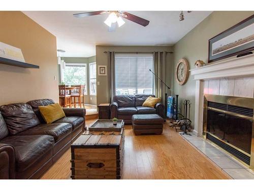 6121 96 Street, Grande Prairie, AB - Indoor Photo Showing Living Room With Fireplace