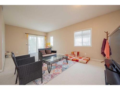 201E-8640 103 Avenue, Grande Prairie, AB - Indoor Photo Showing Living Room