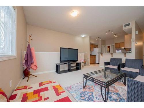 201E-8640 103 Avenue, Grande Prairie, AB - Indoor Photo Showing Living Room