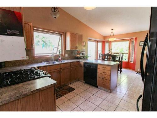 8133 106A Street, Grande Prairie, AB - Indoor Photo Showing Kitchen With Double Sink