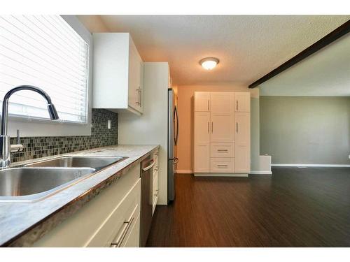 8218 96 Street, Peace River, AB - Indoor Photo Showing Kitchen With Double Sink