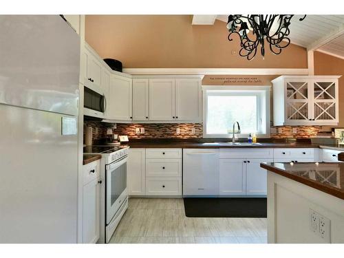 10010 88 Street, Peace River, AB - Indoor Photo Showing Kitchen With Double Sink