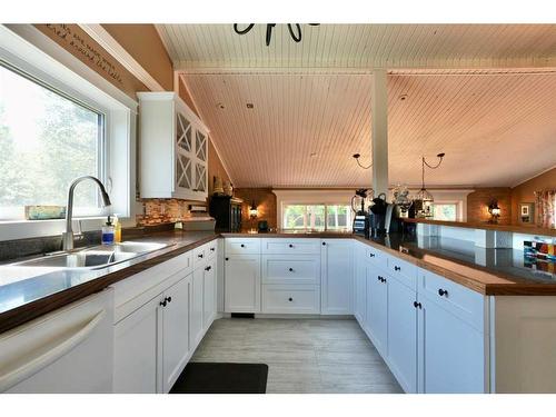 10010 88 Street, Peace River, AB - Indoor Photo Showing Kitchen With Double Sink