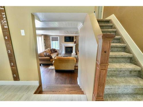 10010 88 Street, Peace River, AB - Indoor Photo Showing Other Room With Fireplace