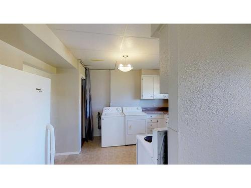 9837 100A Avenue, Sexsmith, AB - Indoor Photo Showing Laundry Room