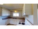 9837 100A Avenue, Sexsmith, AB  - Indoor Photo Showing Kitchen With Double Sink 