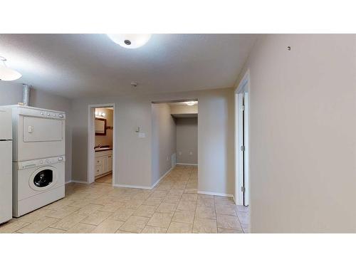 9837 100A Avenue, Sexsmith, AB - Indoor Photo Showing Laundry Room