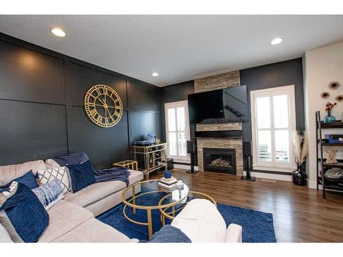 8918 94 Avenue, Grande Prairie, AB - Indoor Photo Showing Living Room With Fireplace