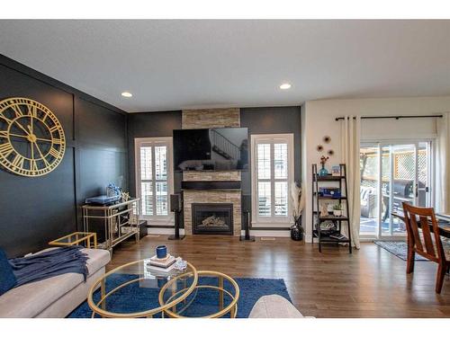 8918 94 Avenue, Grande Prairie, AB - Indoor Photo Showing Living Room With Fireplace