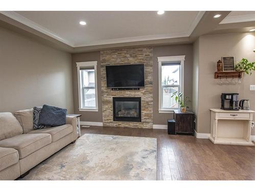 8822 87 Avenue, Grande Prairie, AB - Indoor Photo Showing Living Room With Fireplace