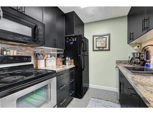 207-10405 99 Avenue, Grande Prairie, AB - Indoor Photo Showing Kitchen With Double Sink