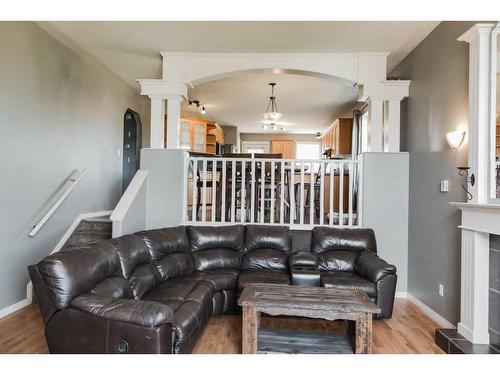 7122 90 Street, Grande Prairie, AB - Indoor Photo Showing Living Room With Fireplace